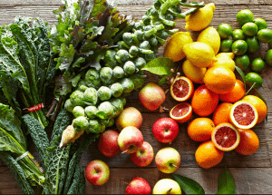 a group of fruits and vegetables on a wood surface Healthy Weight Loss Diets Chorley
